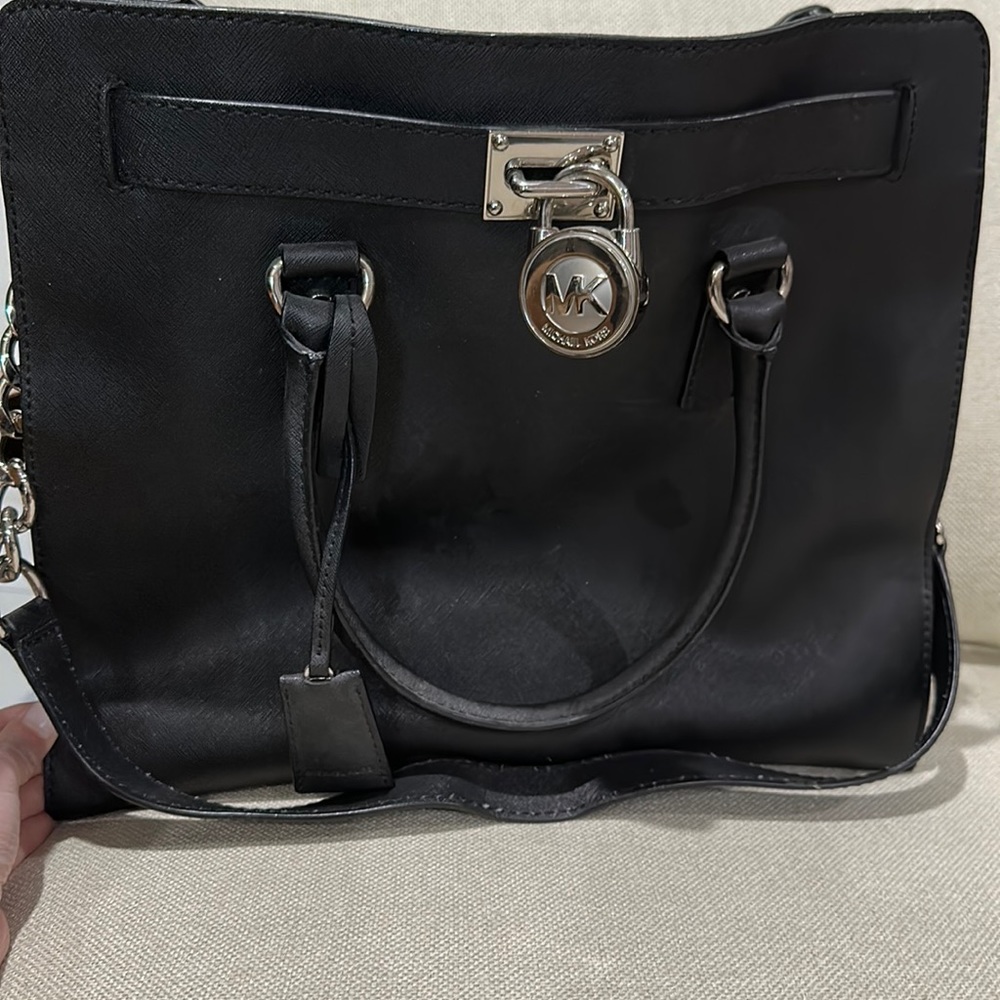Black Michael Kors bag with silver hardware